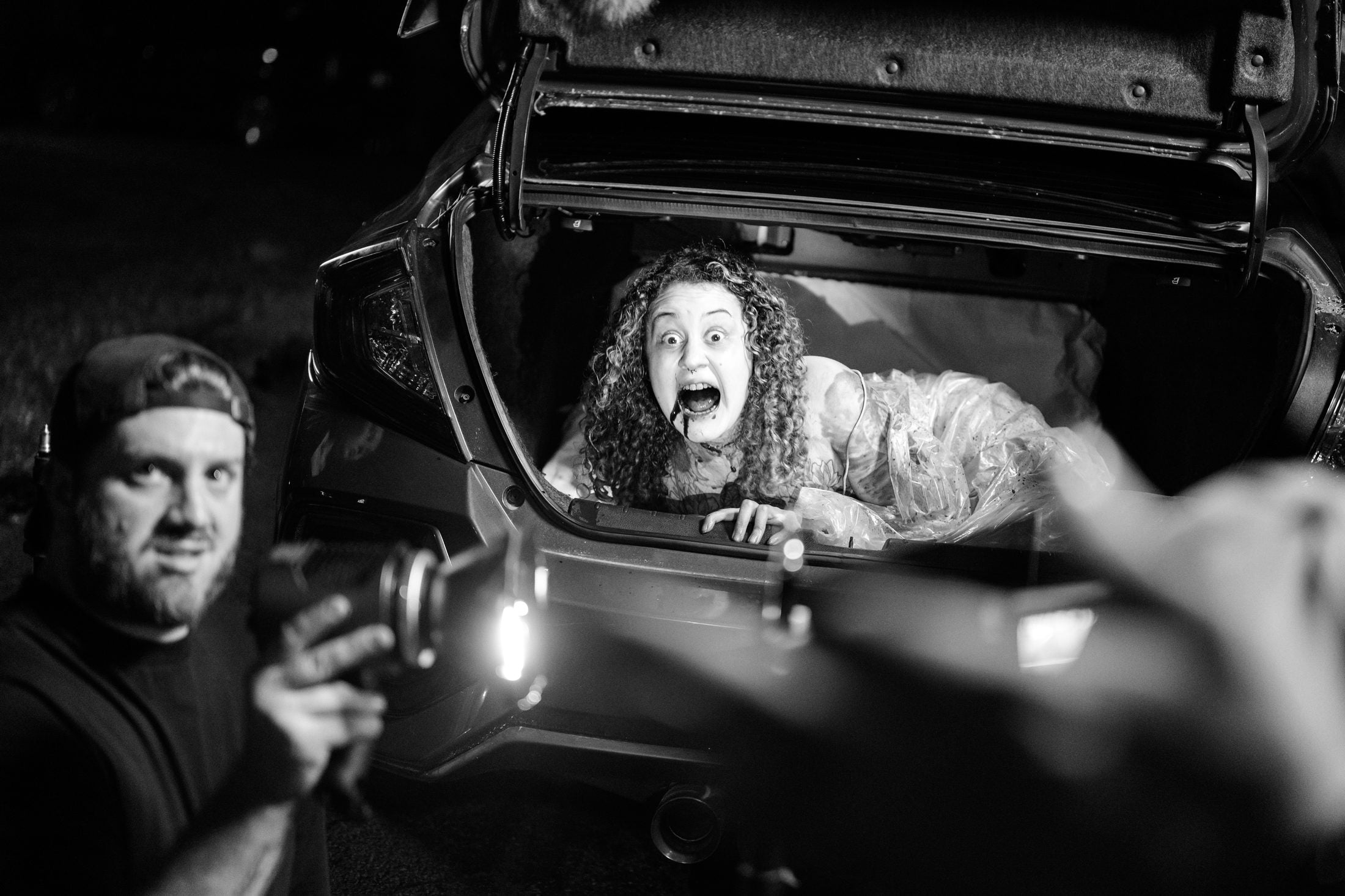 Crew lighting the trunk by hand during filming