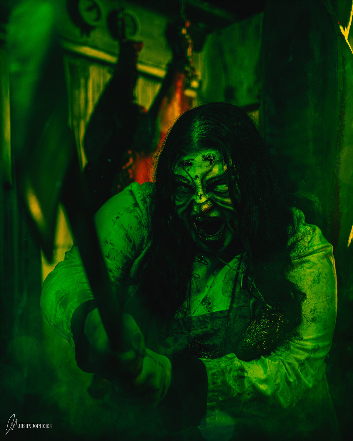 Axe raised in green light